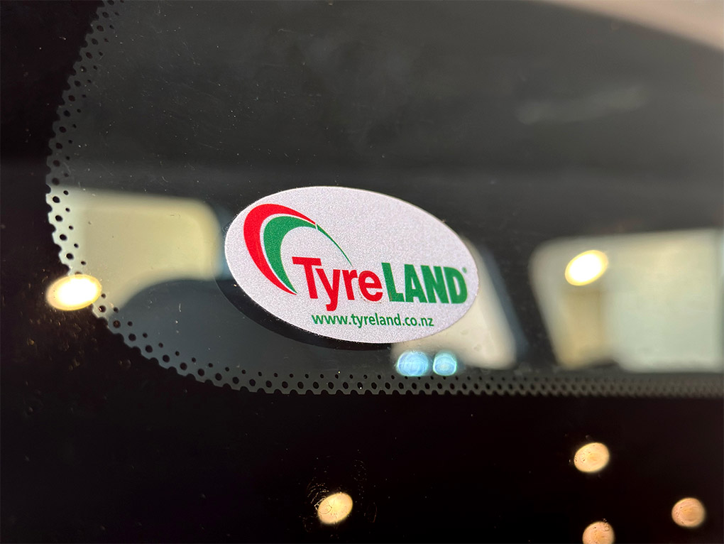 TyreLAND VIP sticker on the rear window of a car